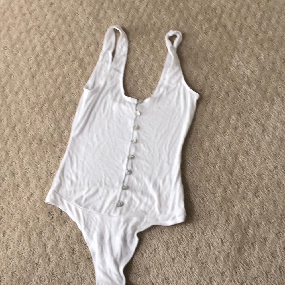 Vici white bodysuit. Never been worn.